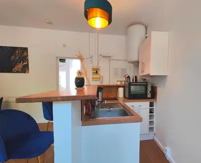 Cuisine ou kitchenette dans l'établissement Appart'HomeCity - Rouen Marne 1850