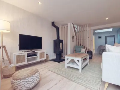 Télévision ou salle de divertissement dans l'établissement La Casa de la Mouette Rieuse