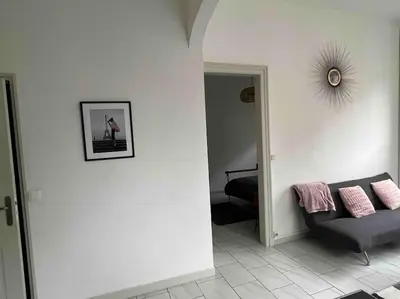 Coin salon dans l'établissement Belle maison quartier Henriville, proche centre