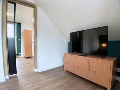 Télévision ou salle de divertissement dans l'établissement Eco-Appart'hôtel Rouen - SLT