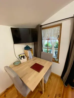 Télévision ou salle de divertissement dans l'établissement Aux grès des moisonettes