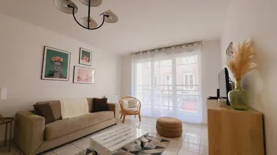 Télévision ou salle de divertissement dans l'établissement Le Gabrielle-Charmant Appartement-Parking