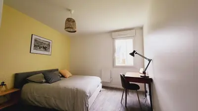 Un ou plusieurs lits dans un hébergement de l'établissement Le Gabrielle-Charmant Appartement-Parking