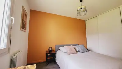 Un ou plusieurs lits dans un hébergement de l'établissement Le Gabrielle-Charmant Appartement-Parking