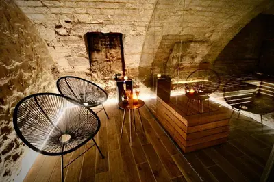 Coin salon dans l'établissement Spa Gaalor***** - Jacuzzi & Sauna à Rouen