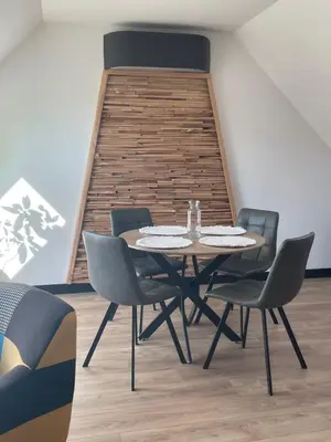 Coin salon dans l'établissement appartement des mésanges