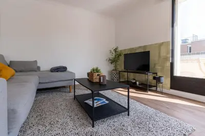 Télévision ou salle de divertissement dans l'établissement ABONDANCE - Logement urbain, lumineux et design pour 4 pers