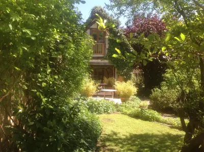 Jardin de l'établissement Au Fond du Jardin Maison d'hôtes