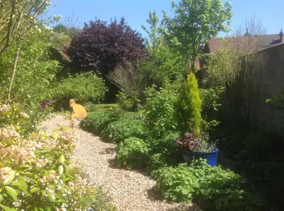 Jardin de l'établissement Au Fond du Jardin Maison d'hôtes