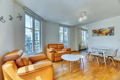 Coin salon dans l'établissement Carlos logement au pied du Gros Horloge !