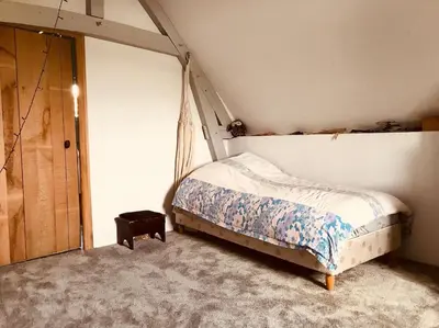 Un ou plusieurs lits dans un hébergement de l'établissement Grande Maison en bord de Seine, 1h 15de Paris