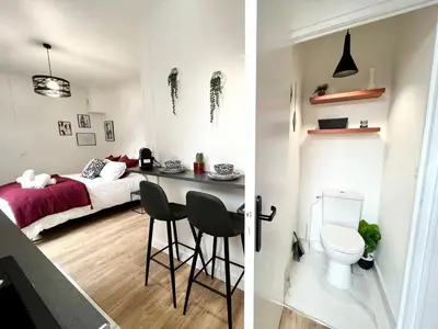Un ou plusieurs lits dans un hébergement de l'établissement Le JOY, studio au coeur de la ville