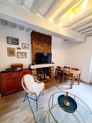 Télévision ou salle de divertissement dans l'établissement Appartement, terrasse & barbecue