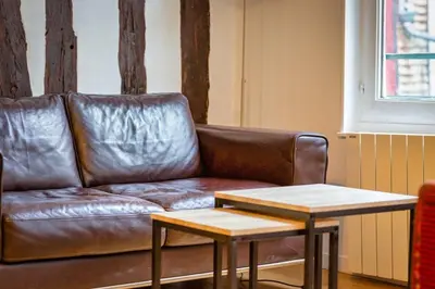 Coin salon dans l'établissement Le Charmant F2 rue du Gros Horloge à Rouen!