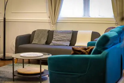 Coin salon dans l'établissement Vieux Marché Sublime appartement avec ascenseur