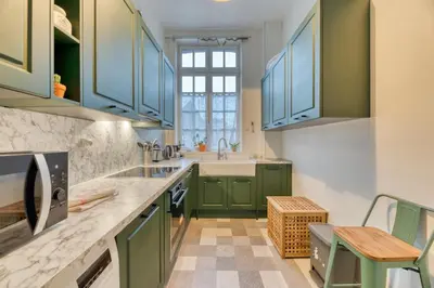 Cuisine ou kitchenette dans l'établissement Vieux Marché Sublime appartement avec ascenseur