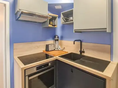 Cuisine ou kitchenette dans l'établissement Cosy'Appart - LE SAINT MAUR