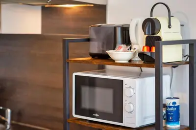 Cuisine ou kitchenette dans l'établissement Le Rémi studio rénové au coeur de Rouen
