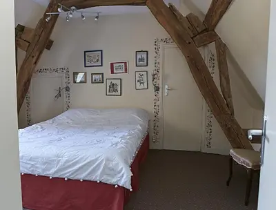 Un ou plusieurs lits dans un hébergement de l'établissement Gîte du Presbytère de L'Abbé L'Hermina