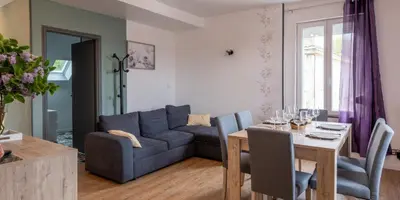 Coin salon dans l'établissement Appartement rénové tout confort