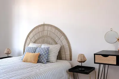 Un ou plusieurs lits dans un hébergement de l'établissement L'impasse - Maison avec jardin proche du centre