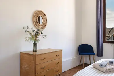 Un ou plusieurs lits dans un hébergement de l'établissement L'impasse - Maison avec jardin proche du centre