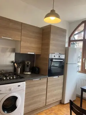 Cuisine ou kitchenette dans l'établissement Appartement duplex de charme