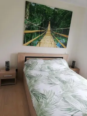 Un ou plusieurs lits dans un hébergement de l'établissement Villa Paradisiaque 3 Étoiles Détente chez Suzanne