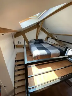 Un ou plusieurs lits dans un hébergement de l'établissement Loft: Le New-York