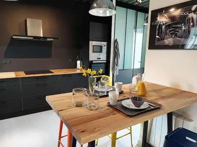 Cuisine ou kitchenette dans l'établissement Le Loft - Cocon industriel