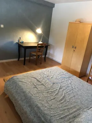 Un ou plusieurs lits dans un hébergement de l'établissement Appartement atypique