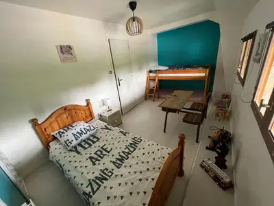 Un ou plusieurs lits dans un hébergement de l'établissement Appartement atypique