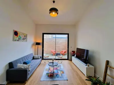 Coin salon dans l'établissement Le Bellay ¤ 2 Chambres ¤ Cour ¤10 mins Centre¤