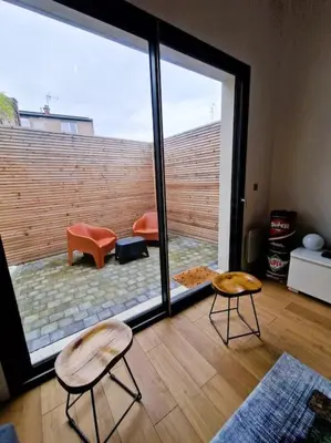 Coin salon dans l'établissement Le Bellay ¤ 2 Chambres ¤ Cour ¤10 mins Centre¤