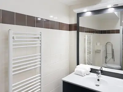 Salle de bains dans l'établissement Terres de France - Appart Hôtel Rouen Flaubert