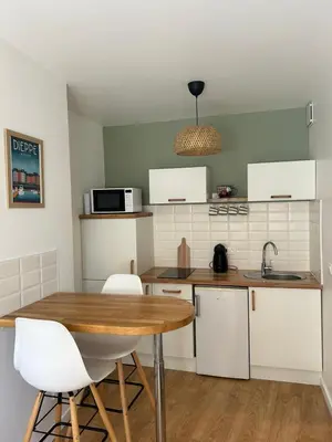 Cuisine ou kitchenette dans l'établissement Les voiles