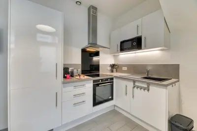 Cuisine ou kitchenette dans l'établissement Hervé maison de ville