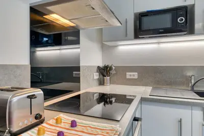 Cuisine ou kitchenette dans l'établissement Hervé maison de ville