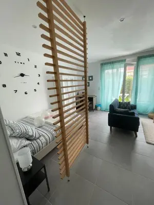 Un ou plusieurs lits dans un hébergement de l'établissement Studio meuble Kenaya 29m2.