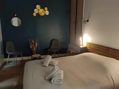Un ou plusieurs lits dans un hébergement de l'établissement Duplex cosy hyper centre