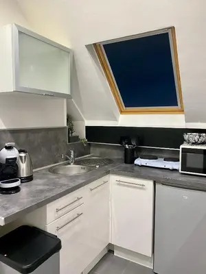 Cuisine ou kitchenette dans l'établissement Studio chaleureux hypercentre Amiens