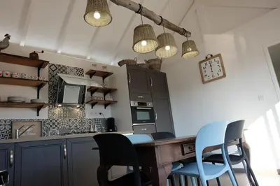 Cuisine ou kitchenette dans l'établissement Le GITE DU VILLAGE