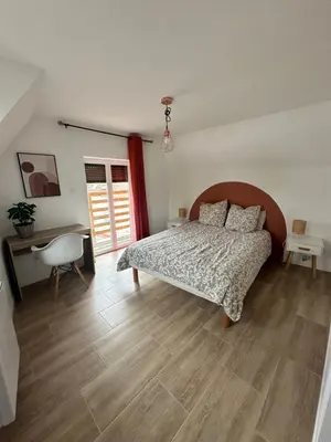 Un ou plusieurs lits dans un hébergement de l'établissement Appartements Pacy-sur-Eure