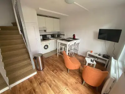 Cuisine ou kitchenette dans l'établissement Maison Triplex du jardin des plantes