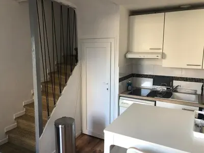 Cuisine ou kitchenette dans l'établissement Maison Triplex du jardin des plantes