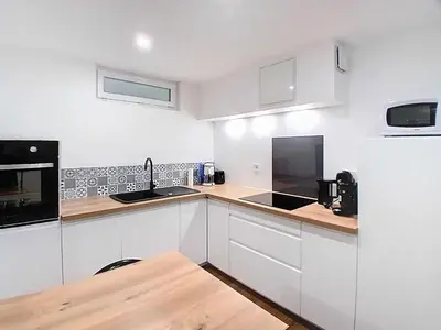 Cuisine ou kitchenette dans l'établissement Appartement Criel-sur-Mer