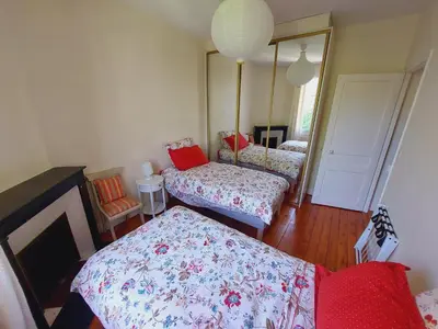 Un ou plusieurs lits dans un hébergement de l'établissement Villa Capucine - Maison de ville avec jardin dans Vernon-Giverny