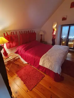 Un ou plusieurs lits dans un hébergement de l'établissement Maison spacieuse