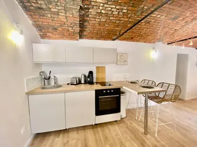 Cuisine ou kitchenette dans l'établissement Les Amourettes