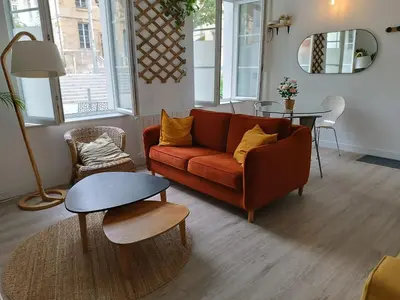 Coin salon dans l'établissement Duplex hypercentre avec parking